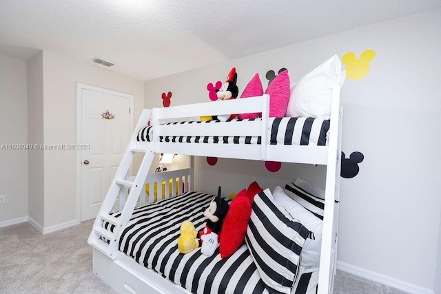 1515 Carey Palm Cir, Kissimmee, FL 34747 - carpeted bedroom with a textured ceiling and baseboards
