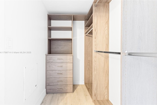 16385 Biscayne Blvd Unit 404, North Miami Beach, FL 33160 - spacious closet featuring wood finished floors