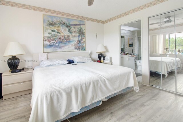 1400 SW 137th Ave Unit 311F, Pembroke Pines, FL 33027 - bedroom with light wood-type flooring, a closet, ensuite bath, and a ceiling fan