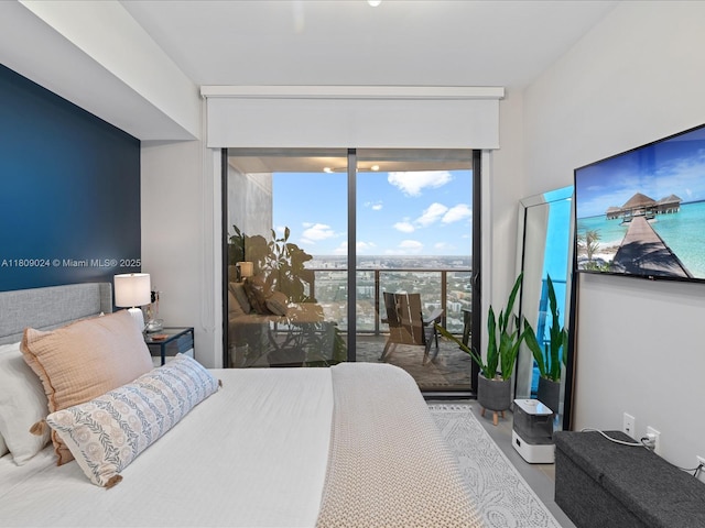 1600 NE 1st Ave Unit 3311, Miami, FL 33132 - bedroom featuring floor to ceiling windows and wood finished floors