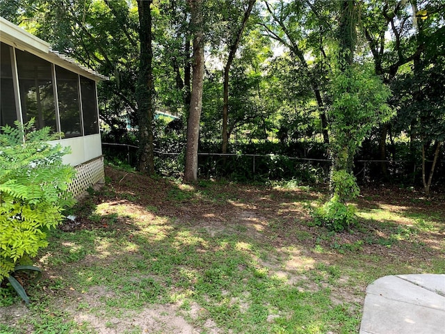 325 E Plymouth, Deland, FL 32724 - view of yard featuring a sunroom