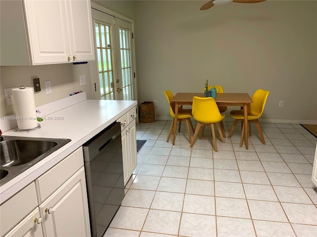 325 E Plymouth, Deland, FL 32724 - kitchen featuring dishwasher, white cabinetry, light countertops, and light tile patterned flooring