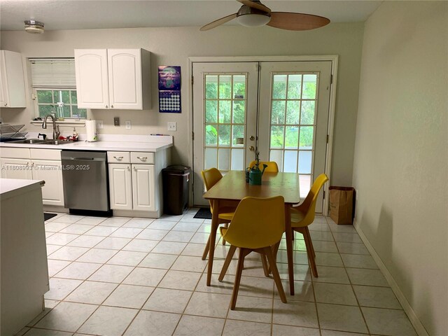 325 E Plymouth, Deland, FL 32724 - kitchen featuring dishwasher, a sink, a ceiling fan, white cabinetry, and light tile patterned floors