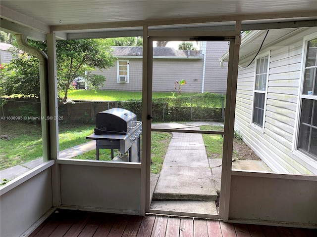 325 E Plymouth, Deland, FL 32724 - unfurnished sunroom featuring cooling unit
