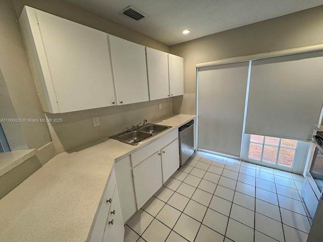 12873 SW 65th Ter, Miami, FL 33183 - kitchen featuring a sink, dishwasher, light countertops, white cabinets, and recessed lighting