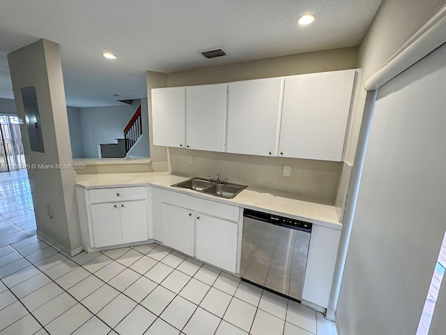 12873 SW 65th Ter, Miami, FL 33183 - kitchen featuring stainless steel dishwasher, a sink, light countertops, white cabinetry, and recessed lighting