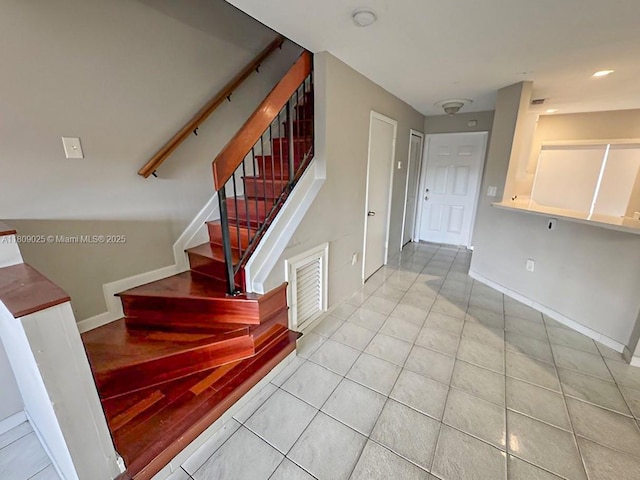 12873 SW 65th Ter, Miami, FL 33183 - stairs featuring tile patterned flooring and baseboards