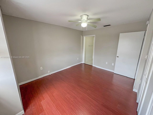 12873 SW 65th Ter, Miami, FL 33183 - unfurnished bedroom featuring wood finished floors, baseboards, and a ceiling fan