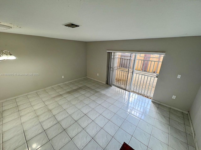 12873 SW 65th Ter, Miami, FL 33183 - unfurnished room with light tile patterned floors and baseboards