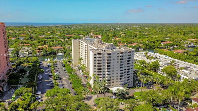 90 Edgewater Dr Unit 106, Coral Gables, FL 33133 - aerial view of a nearby body of water, apartment complex, and a heavily wooded area