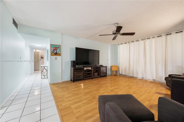 6821 SW 147th Ave Unit 1F, Miami, FL 33193 - living room with ceiling fan and light wood-type flooring