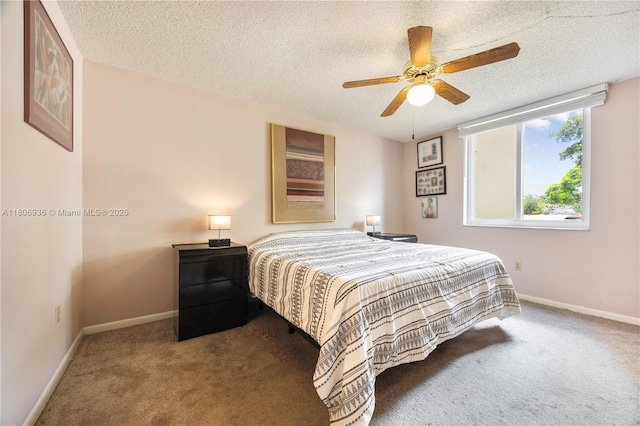 6821 SW 147th Ave Unit 1F, Miami, FL 33193 - bedroom with carpet flooring, a textured ceiling, baseboards, and a ceiling fan