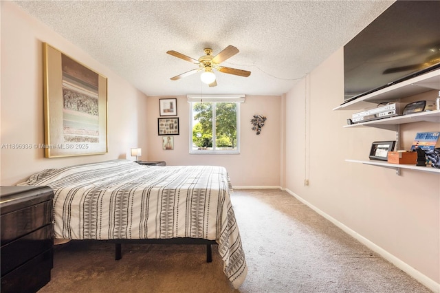 6821 SW 147th Ave Unit 1F, Miami, FL 33193 - carpeted bedroom featuring baseboards, a textured ceiling, and a ceiling fan
