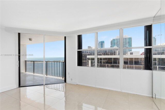 1901 Brickell Ave Unit B1903, Miami, FL 33129 - tiled empty room featuring plenty of natural light and a city view