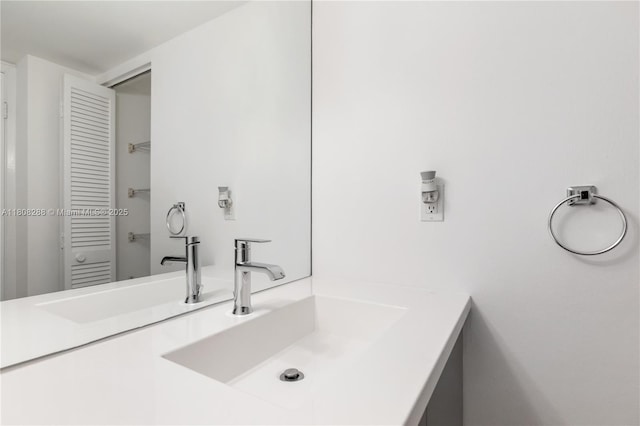 1901 Brickell Ave Unit B1903, Miami, FL 33129 - bathroom with vanity and a closet
