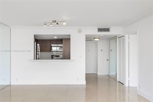 1901 Brickell Ave Unit B1903, Miami, FL 33129 - unfurnished living room with crown molding, light tile patterned flooring, and baseboards