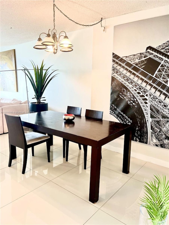 100 Bayview Dr Unit 1919, Sunny Isles Beach, FL 33160 - tiled dining room with a chandelier and a textured ceiling