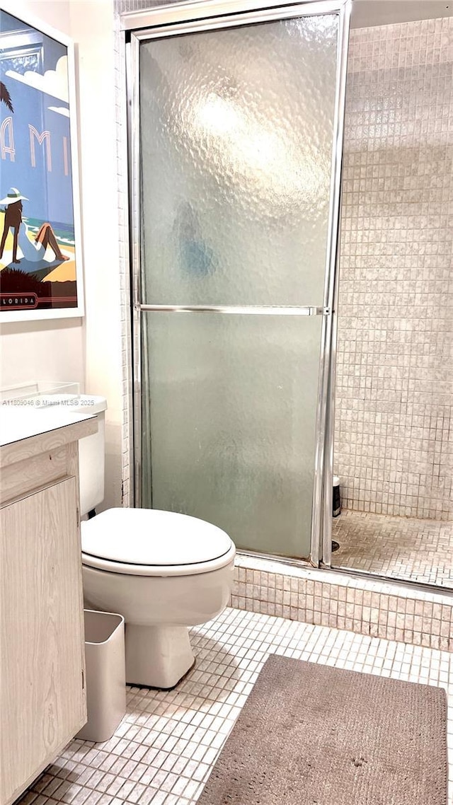100 Bayview Dr Unit 1919, Sunny Isles Beach, FL 33160 - bathroom with a stall shower, vanity, and tile patterned floors