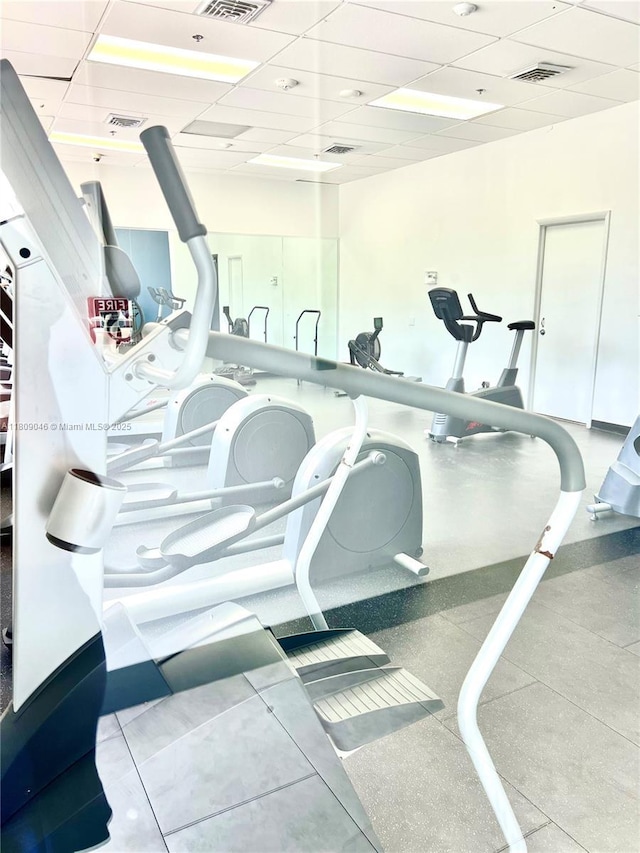 100 Bayview Dr Unit 1919, Sunny Isles Beach, FL 33160 - exercise room with a paneled ceiling