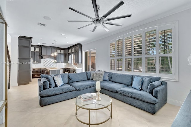 4231 N Magnolia Cir, Delray Beach, FL 33445 - living room featuring a ceiling fan, light tile patterned floors, recessed lighting, and baseboards