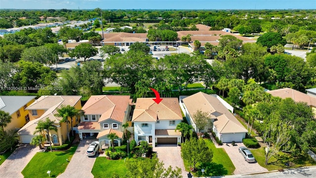 4231 N Magnolia Cir, Delray Beach, FL 33445 - aerial view of residential area featuring a tree filled landscape