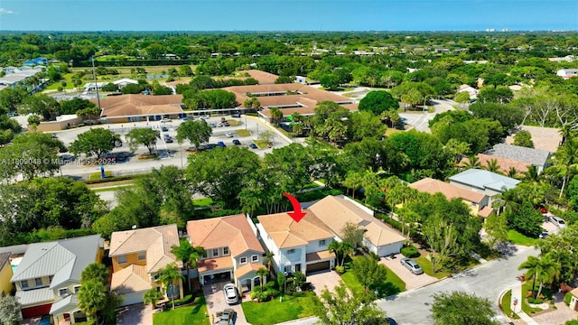 4231 N Magnolia Cir, Delray Beach, FL 33445 - aerial perspective of suburban area with a tree filled landscape