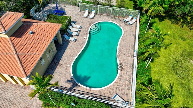 4231 N Magnolia Cir, Delray Beach, FL 33445 - community pool with a patio area