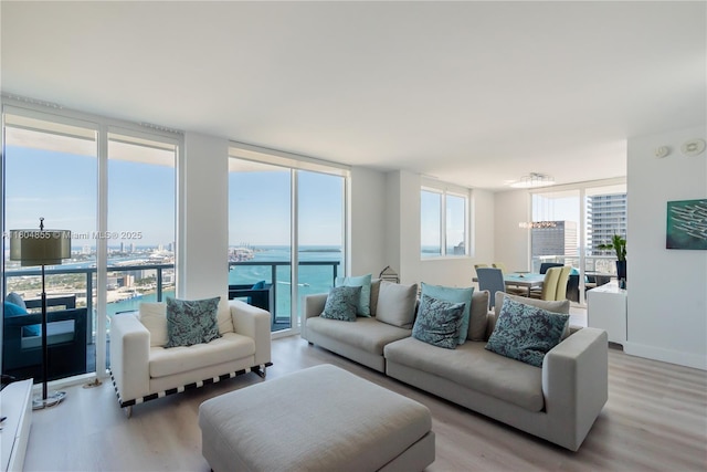 244 Biscayne Blvd Unit 3703, Miami, FL 33132 - living area with light wood finished floors and expansive windows
