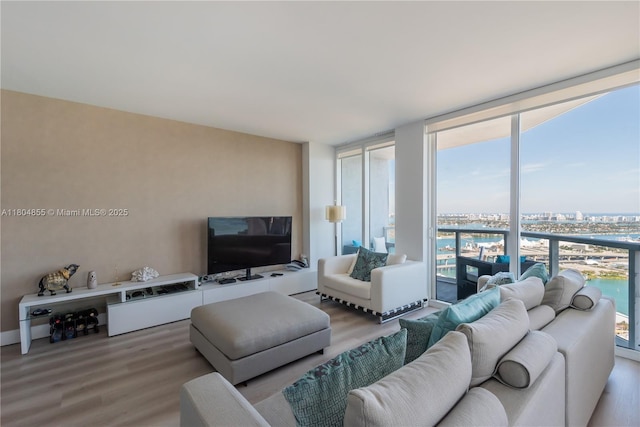 244 Biscayne Blvd Unit 3703, Miami, FL 33132 - living area with wood finished floors, healthy amount of natural light, and floor to ceiling windows