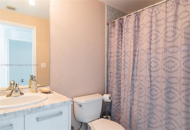 244 Biscayne Blvd Unit 3703, Miami, FL 33132 - full bath with vanity, toilet, and a shower with shower curtain