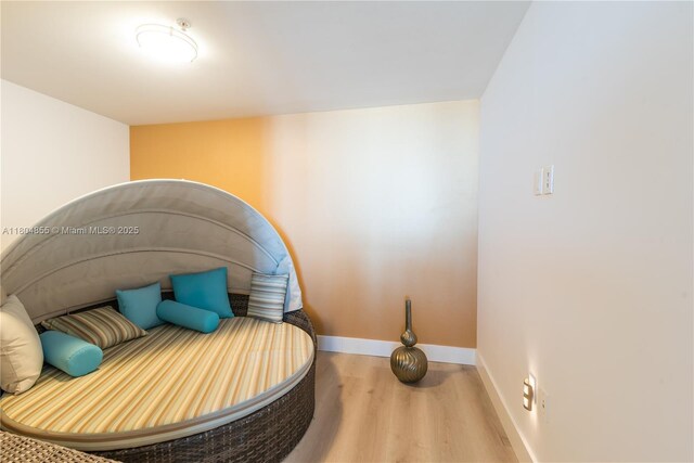 244 Biscayne Blvd Unit 3703, Miami, FL 33132 - sitting room with wood finished floors and baseboards