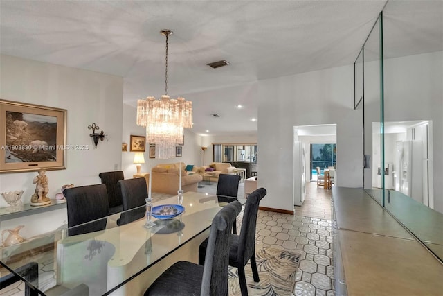 3721 N Park Rd, Hollywood, FL 33021 - tiled dining area featuring a chandelier and recessed lighting