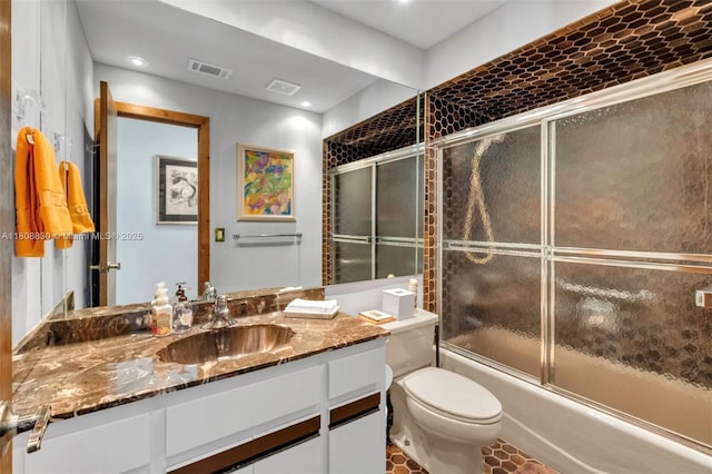 3721 N Park Rd, Hollywood, FL 33021 - full bathroom with vanity, toilet, bath / shower combo with glass door, and tile patterned flooring
