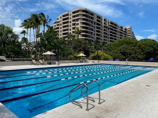 251 Crandon Blvd Unit 904, Key Biscayne, FL 33149 - community pool featuring a patio