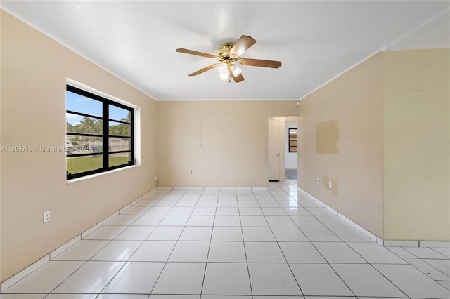 778 NW 146th St, Miami, FL 33168 - empty room with ceiling fan and light tile patterned floors