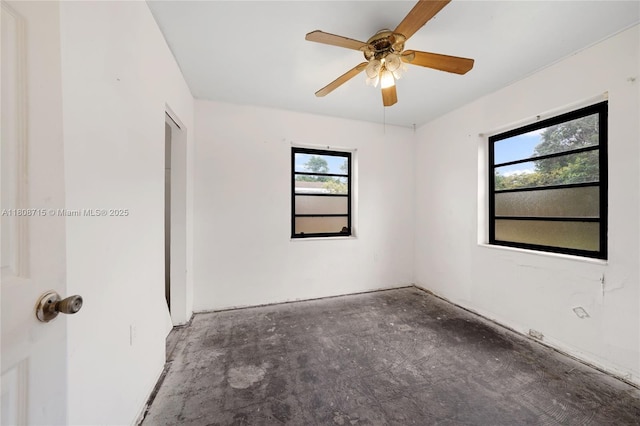 778 NW 146th St, Miami, FL 33168 - empty room featuring ceiling fan and unfinished concrete floors