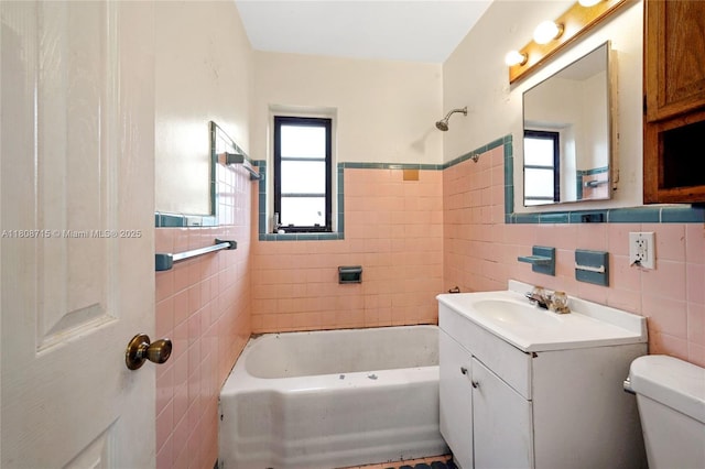 778 NW 146th St, Miami, FL 33168 - bathroom with tile walls, toilet, vanity, bathing tub / shower combination, and wainscoting