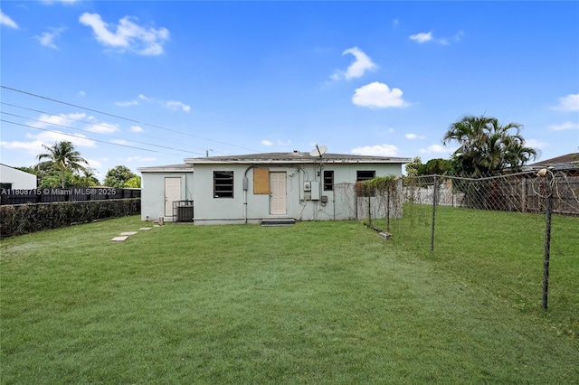 778 NW 146th St, Miami, FL 33168 - rear view of property featuring stucco siding and central AC unit