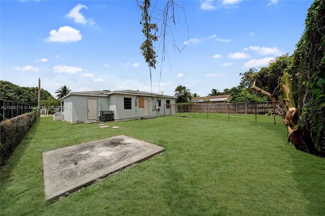 778 NW 146th St, Miami, FL 33168 - view of yard featuring central AC unit