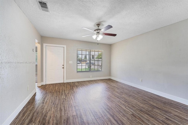 22123 SW 62nd Ct, Boca Raton, FL 33428 - unfurnished room featuring dark wood finished floors, a ceiling fan, a textured ceiling, and baseboards