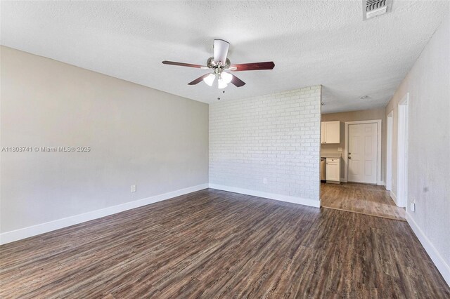 22123 SW 62nd Ct, Boca Raton, FL 33428 - spare room featuring dark wood-style flooring, a ceiling fan, a textured ceiling, and baseboards