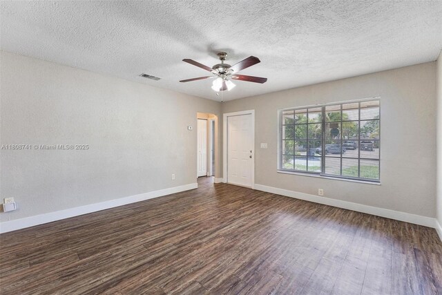 22123 SW 62nd Ct, Boca Raton, FL 33428 - unfurnished room featuring dark wood-type flooring, baseboards, ceiling fan, and a textured ceiling