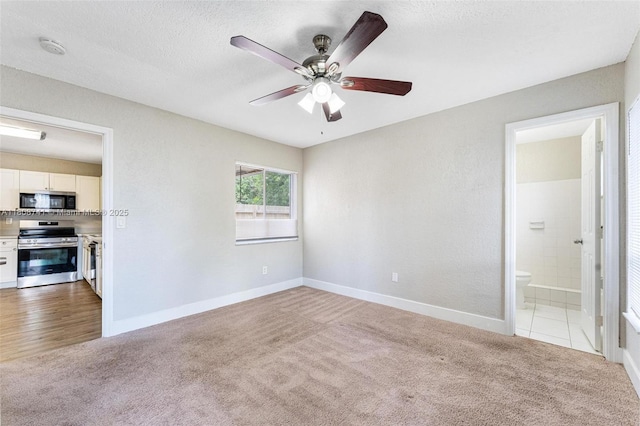 22123 SW 62nd Ct, Boca Raton, FL 33428 - unfurnished room with carpet, a ceiling fan, baseboards, a smoke detector, and a textured ceiling
