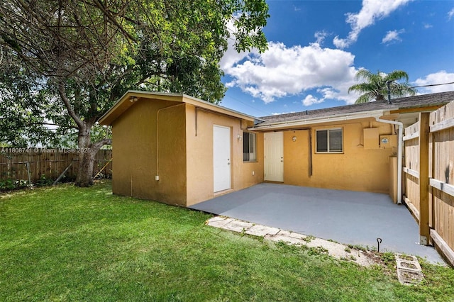 22123 SW 62nd Ct, Boca Raton, FL 33428 - rear view of house with stucco siding and a patio