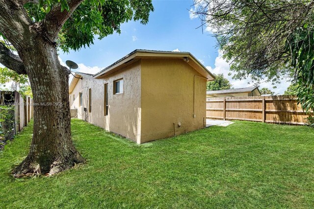 22123 SW 62nd Ct, Boca Raton, FL 33428 - view of side of property with stucco siding