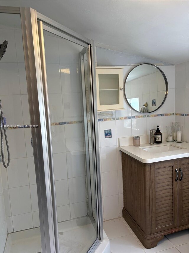7430 Buchanan St, Hollywood, FL 33024 - full bath with tile walls, a stall shower, and vanity
