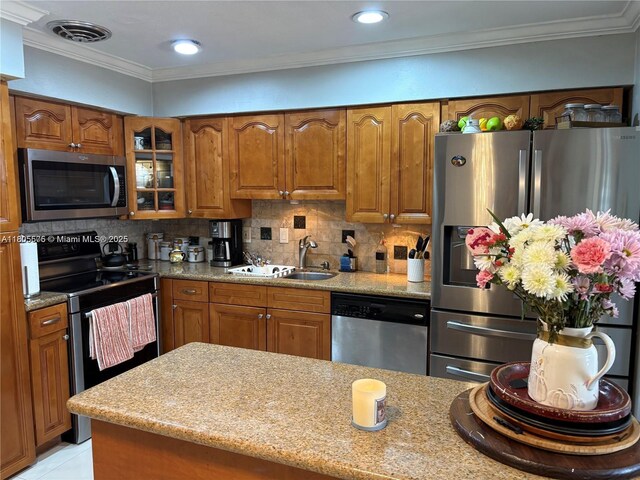 7430 Buchanan St, Hollywood, FL 33024 - bathroom featuring tile walls, vanity, tasteful backsplash, and tile patterned floors