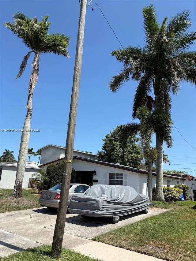 7430 Buchanan St, Hollywood, FL 33024 - view of home's exterior featuring driveway