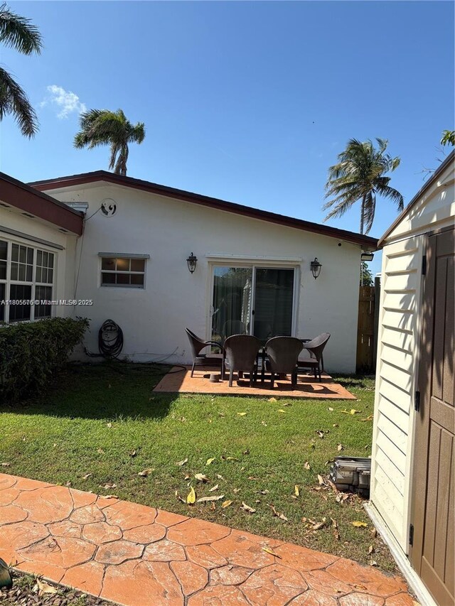 7430 Buchanan St, Hollywood, FL 33024 - view of patio featuring a gate