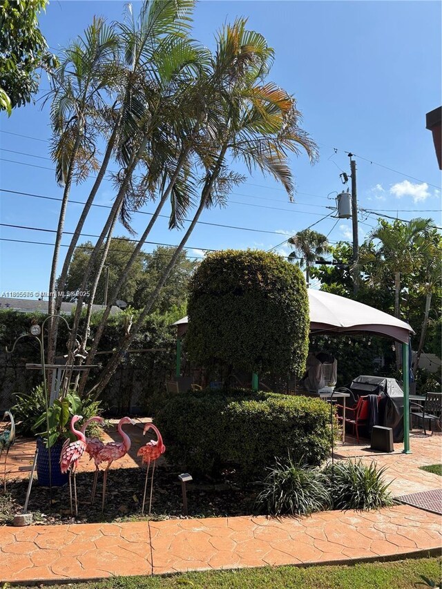 7430 Buchanan St, Hollywood, FL 33024 - view of yard featuring a patio area and a gazebo